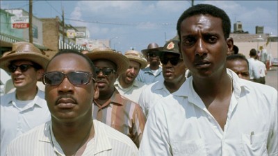 Color photo of Martin Luther King on a march