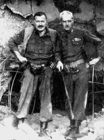 Ernest Hemingway (left) with Col. Charles Lanham in Hürtgen Forest, Germany, 1944. Salinger’s 4th Division was fighting there.