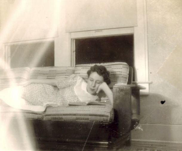 In this scene from Janis Joplin: Little Girl Blue, Janis Joplin's mother, Dorothy Joplin lays on the couch. 