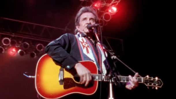 Johnny Cash performing at Nassau Coliseum in Uniondale, N.Y., in 1990. Screenshot from The Highwaymen: Friends Till The End. Courtesy of Sony Music Entertainment. 