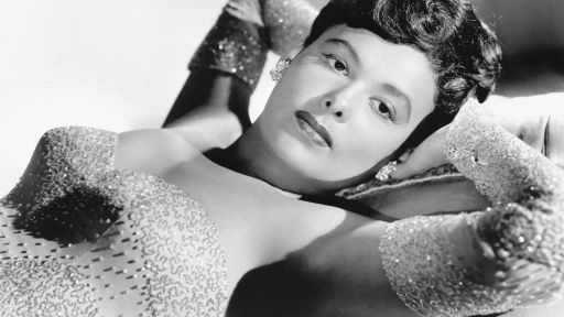 Lena Horne poses in a sequined gown.