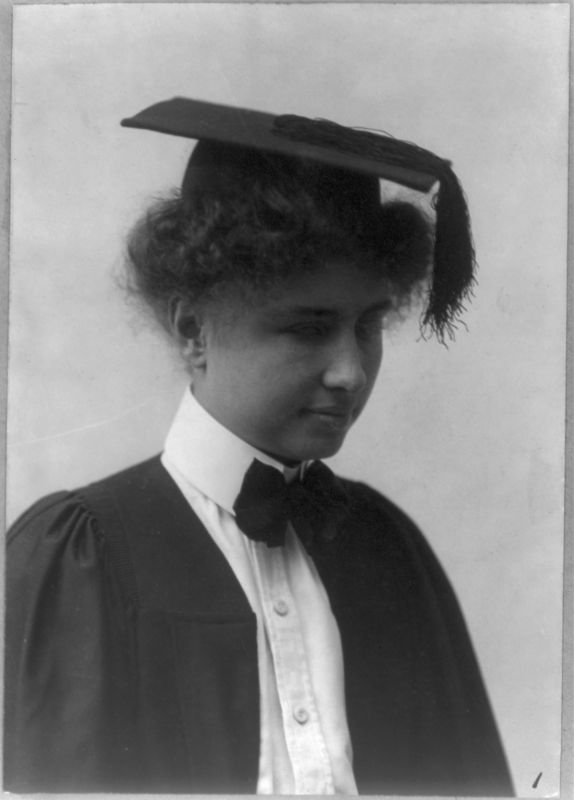 Helen Keller wearing a graduation cap and gown.