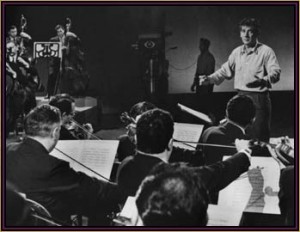 Leonard Bernstein conducting the New York Philharmonic at CBS Studios. 