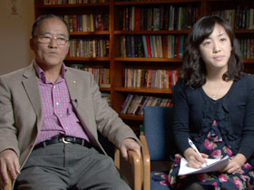 Pastor Phillip Buck with his daughter and interpreter Grace Yoon Yi