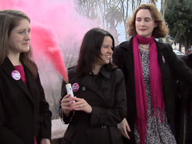 Members of Women's Ordination Conference release pink smoke to protest lack of female leadership in Catholic Church