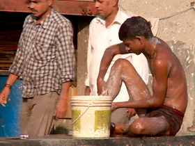 Man bathing in public