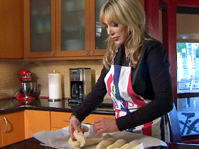 Diane Faith Lille prepares challah bread for the Jewish Sabbath dinner