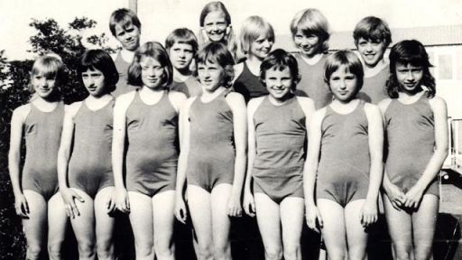 children in swimming clothes, black & white