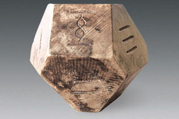 14-face die was used to play ancient Chinese board game. Credit: Image courtesy Chinese Cultural Relics