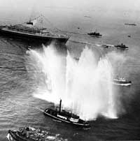 The Andrea Doria steams into New York Harbor amid great fanfare.